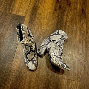Beautiful black and white snake skin patterned ankle boots